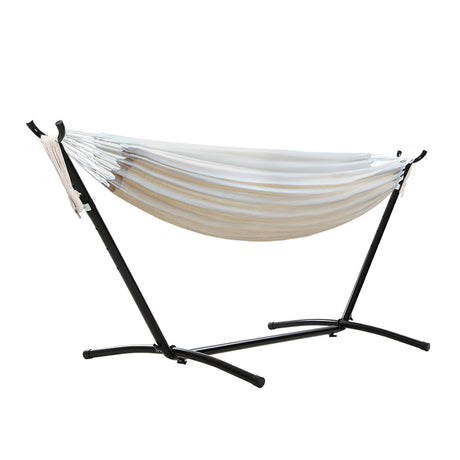 Reedy Creek cream cotton outdoor hammock in an outdoor setting