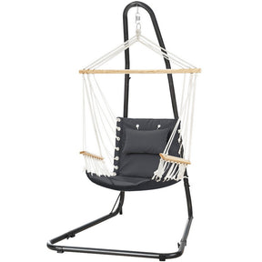 Antigua grey hammock chair with timber armrests and powder coated steel stand in a backyard