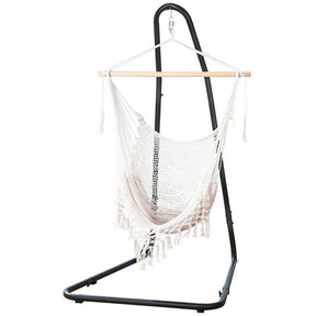 Curacao cream cotton blend hammock chair with timber rail and powder coated steel stand on a patio