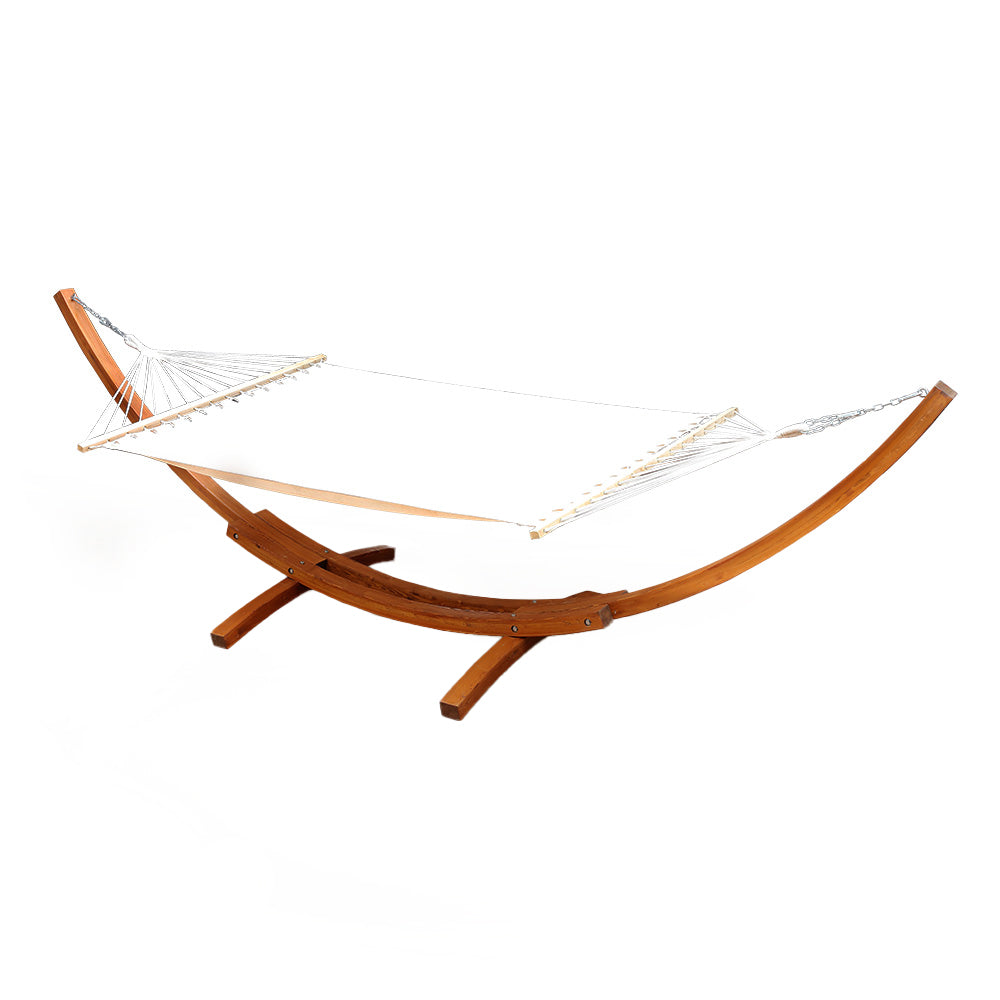 Bayo cream hammock bed on curved larch timber stand