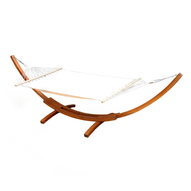 Bayo cream hammock bed on curved larch timber stand