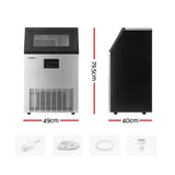 Stainless steel commercial ice maker with door open showing ice bin