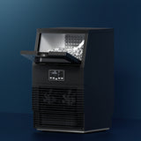 Black benchtop commercial ice maker, front view with inspection window