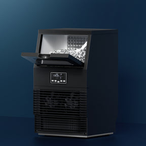 Black benchtop commercial ice maker, front view with inspection window