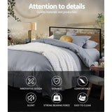 Artiss DANE black industrial double bed frame styled in bedroom — Allure Home Collections