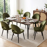 Ebenezer green velvet dining chair in a modern dining room