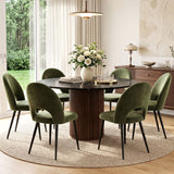 Ebenezer green velvet dining chair in a modern dining room