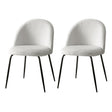 Angaston white sherpa winged dining chairs, set of two, with steel legs in a dining room