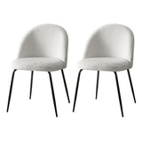 Angaston white sherpa winged dining chairs, set of two, with steel legs in a dining room