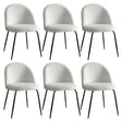 Hahndorf white sherpa winged dining chairs with steel legs around a dining table