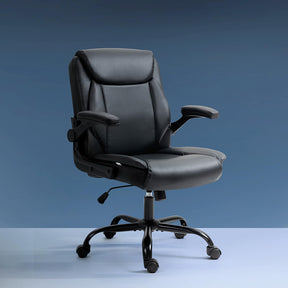 Manjimup mid back executive office chair in black PU leather in a home office