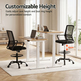 Northcliffe black mesh drafting chair with foot ring at a standing desk