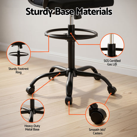 Northcliffe black mesh drafting chair with foot ring at a standing desk