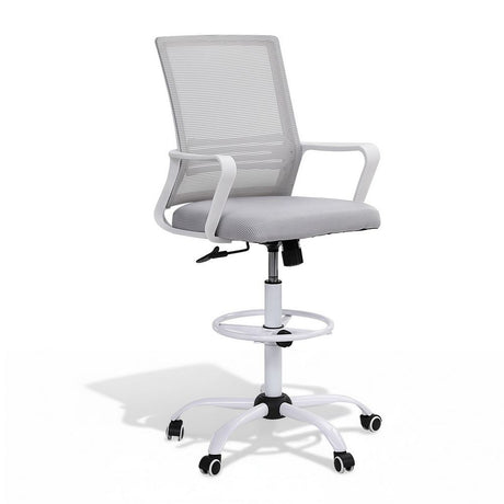 Northcliffe white mesh drafting chair with foot ring at a standing desk