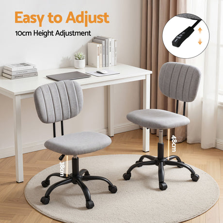 Pingelly grey armless fabric office chair in a small home office