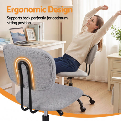 Pingelly grey armless fabric office chair in a small home office