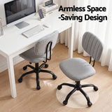Pingelly grey armless fabric office chair in a small home office
