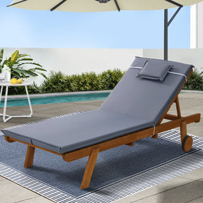 Nature wood timber reclining sun lounger beside a pool