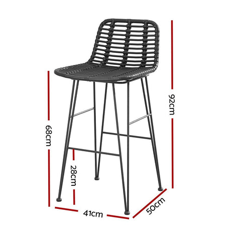 Rosebud West black outdoor wicker bar stool with steel frame on a patio