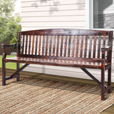 Charcoal brown timber garden bench in an outdoor setting