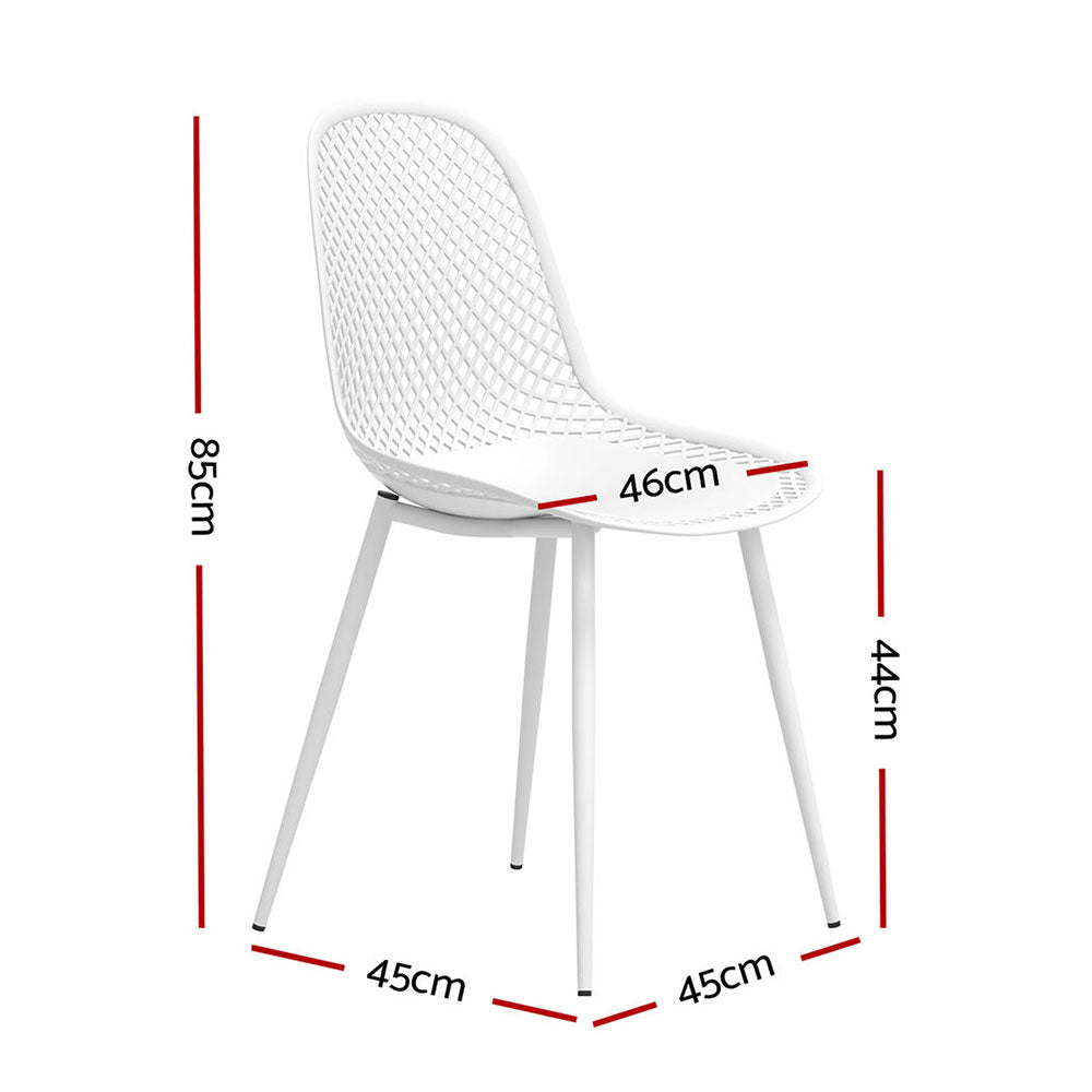 Hyams Beach set of four white polypropylene outdoor dining chairs on a patio