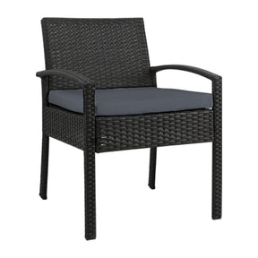 Tapitallee black wicker outdoor lounge chair with grey cushion on a deck