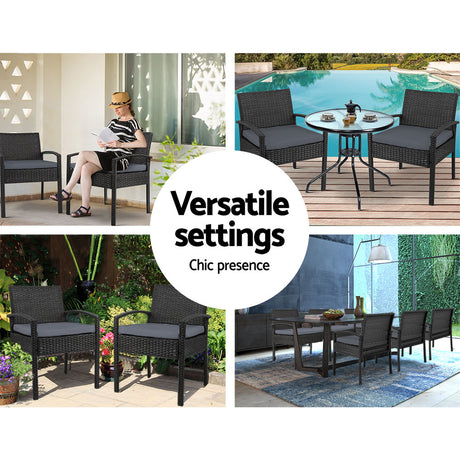 Ulladulla pair of black PE wicker outdoor dining chairs with cushions on a patio