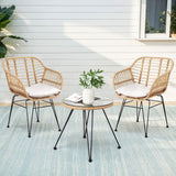 Natural rattan wicker two seat bistro setting with table on a balcony