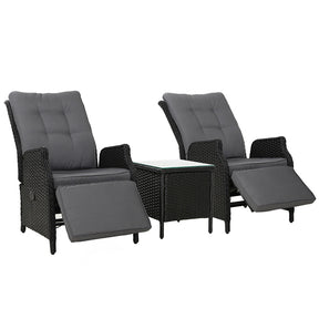 Congo outdoor wicker recliner set with two recliners and a glass top side table on a patio