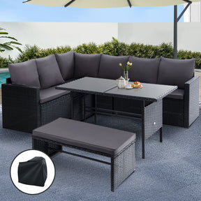 Bokarina 9 seater black outdoor dining lounge set with protective cover on a patio
