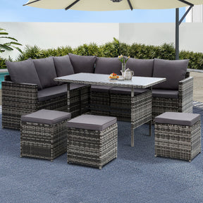 Mermaid Waters modular outdoor wicker sofa and dining set with connecting hooks in a garden