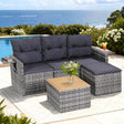 Five piece grey rattan outdoor sofa set with cushions and glass coffee table