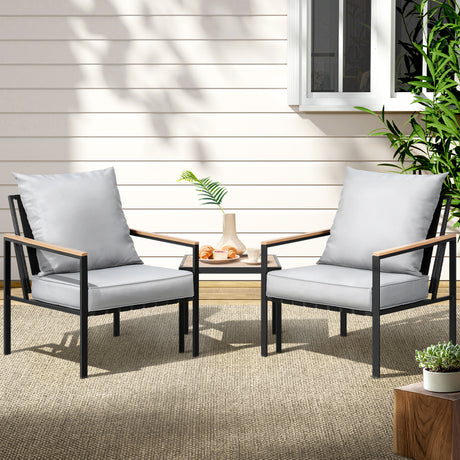 Coomera black steel outdoor lounge set in an outdoor setting