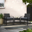 Black rattan wicker two seat bistro setting with table on a balcony