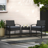 Black rattan wicker two seat bistro setting with table on a balcony