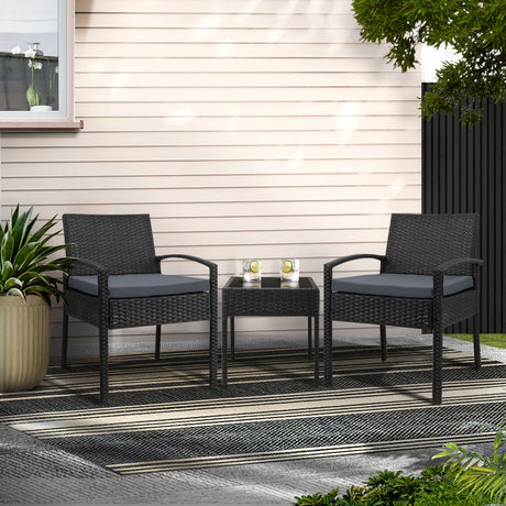 Tamborine black wicker outdoor lounge set in an outdoor setting