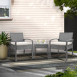 Grey rattan wicker two seat bistro setting with table on a balcony