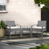 Grey rattan wicker two seat bistro setting with table on a balcony