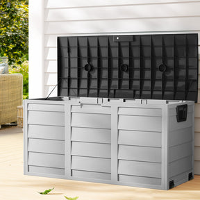 Coffin Bay black weather resistant outdoor storage box on a garden patio