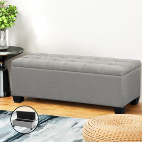 Armstrong Creek button tufted linen storage ottoman blanket box 97cm in grey in a living room