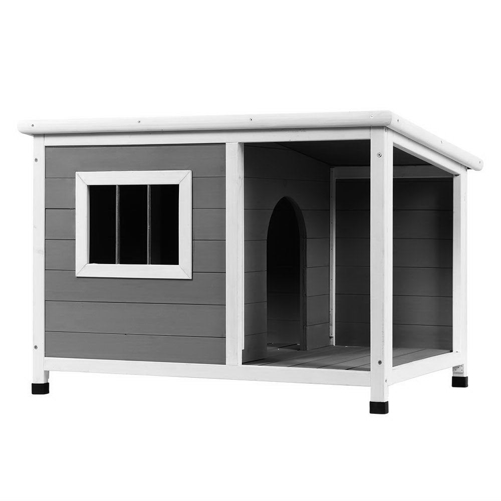 Northcliffe spacious wooden dog kennel in fir wood with a UV resistant asphalt roof outdoors