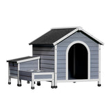 Capel wooden dog kennel in natural fir wood with a UV resistant asphalt roof in a backyard