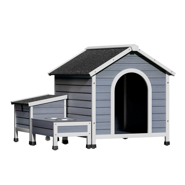 Capel wooden dog kennel in natural fir wood with a UV resistant asphalt roof in a backyard