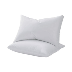 Keswick adjustable shredded memory foam pillow on a bed