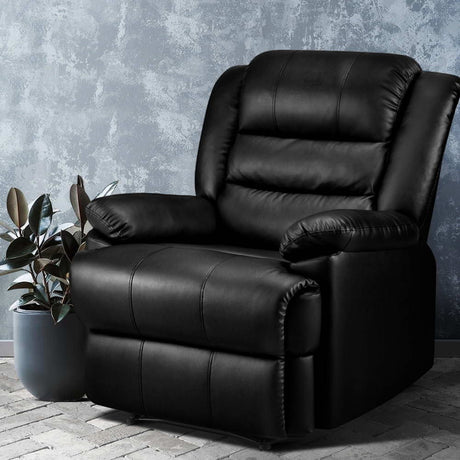 Mount Victoria black PU leather recliner chair in a modern living room