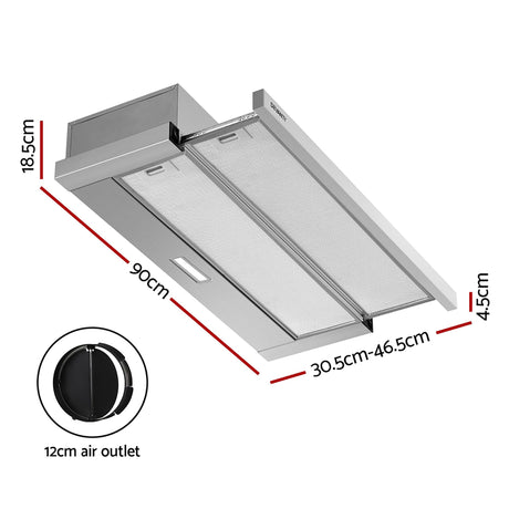 Slide out range hood with the visor extended over a cooktop
