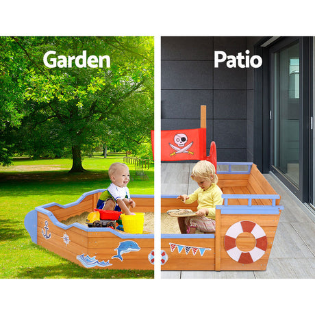 Wooden pirate boat sandpit with steering wheel and bench seats