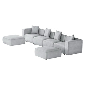 Sitges grey soft linen 6 seater modular sofa chaise in a large living room