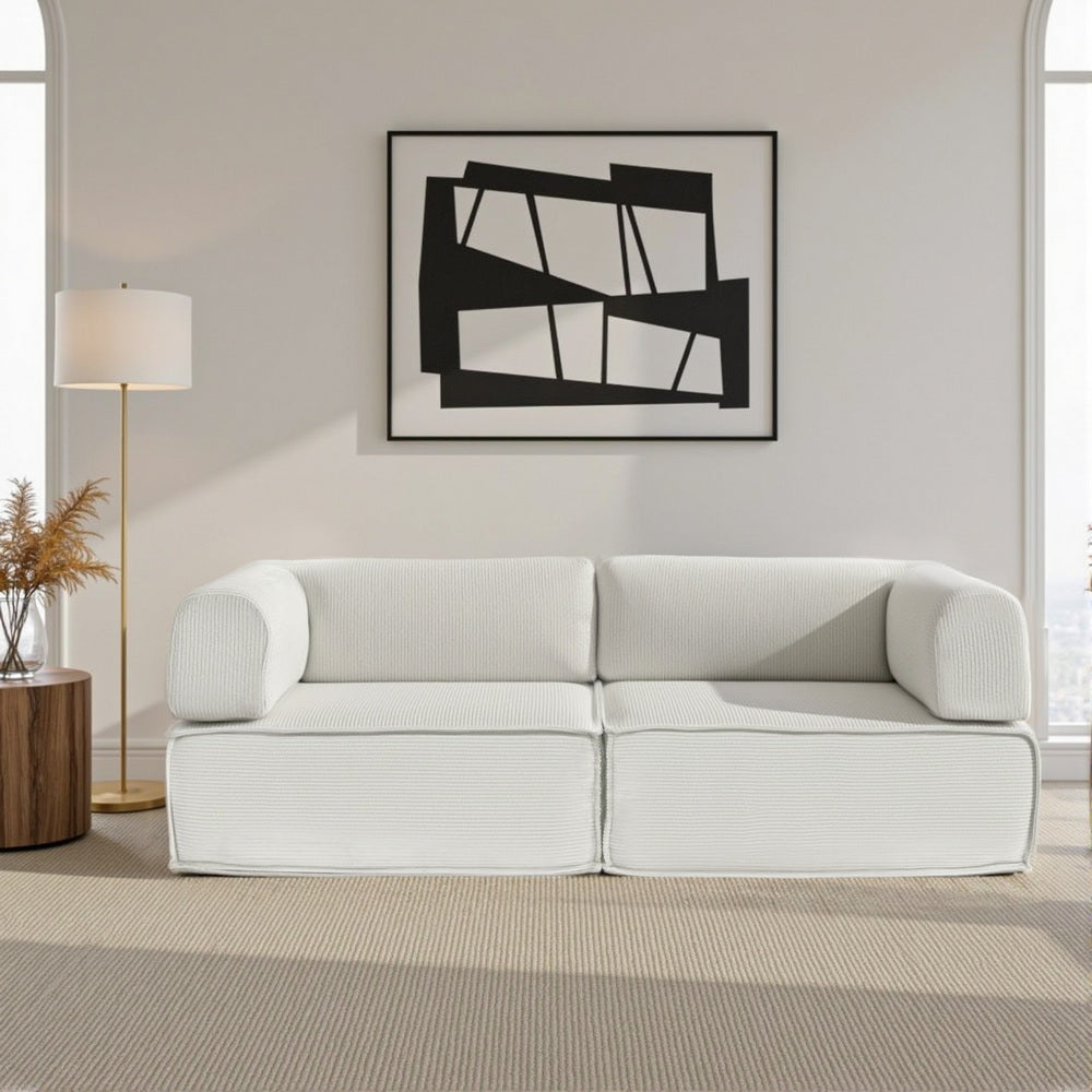Deltebre Beige corduroy sofa bed in a modern living room