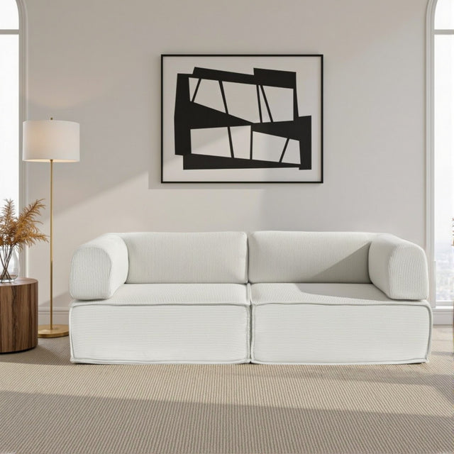 Deltebre Beige corduroy sofa bed in a modern living room